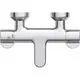 Chromfarbener Badethermostat von Ideal Standard mit zwei Hebeln zum Regulieren der Wassertemperatur, montiert auf einer klaren Basis.